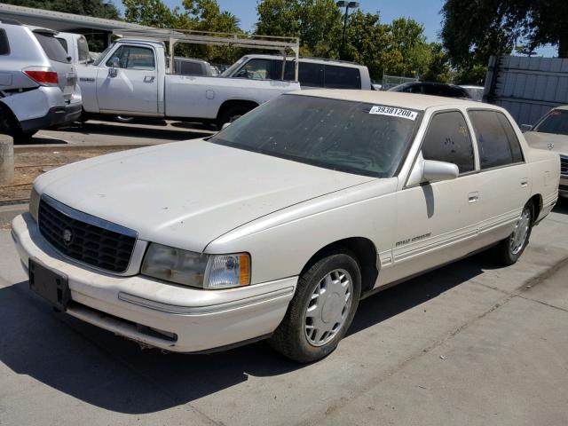 1G6KF5292VU223756 - 1997 CADILLAC DEVILLE CO BEIGE photo 2