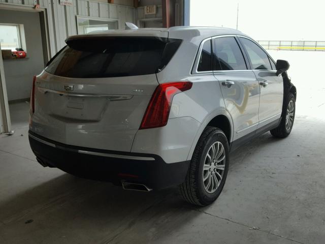 1GYKNCRS4JZ152838 - 2018 CADILLAC XT5 LUXURY SILVER photo 4