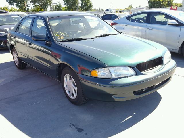 1YVGF22C4X5810965 - 1999 MAZDA 626 ES GREEN photo 1