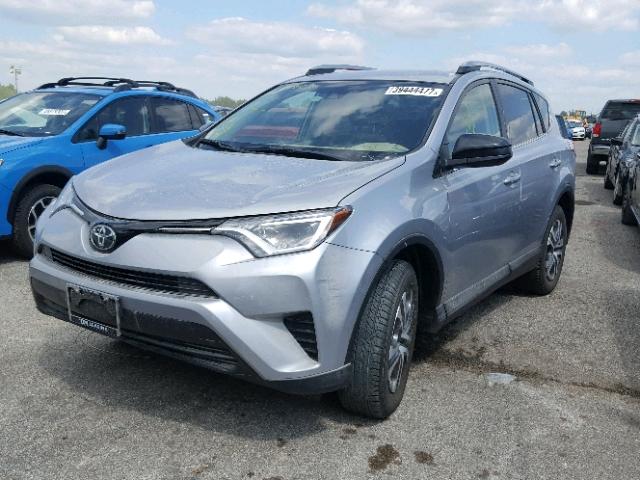 2T3ZFREV0HW397053 - 2017 TOYOTA RAV4 LE SILVER photo 2