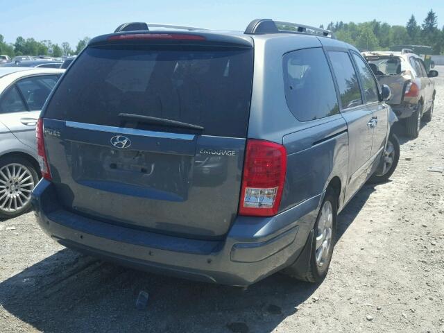 KNDMC233476020656 - 2007 HYUNDAI ENTOURAGE GRAY photo 4