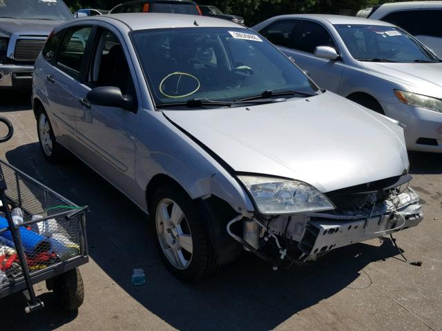 1FAHP37NX7W247699 - 2007 FORD FOCUS ZX5 SILVER photo 1