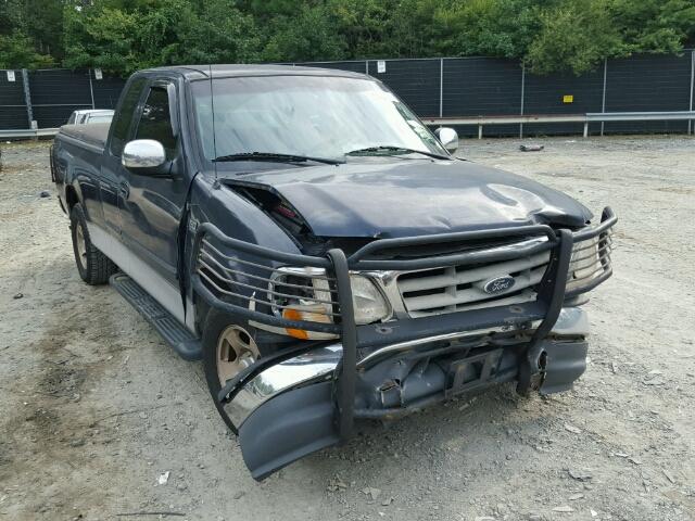 1FTZX1722YNB27850 - 2000 FORD F150 BLUE photo 1