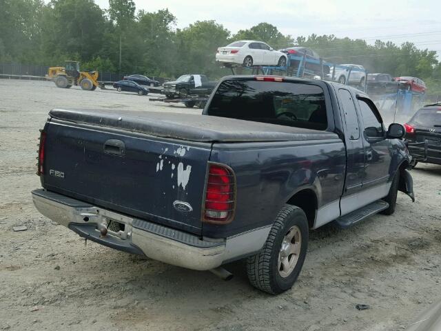 1FTZX1722YNB27850 - 2000 FORD F150 BLUE photo 4