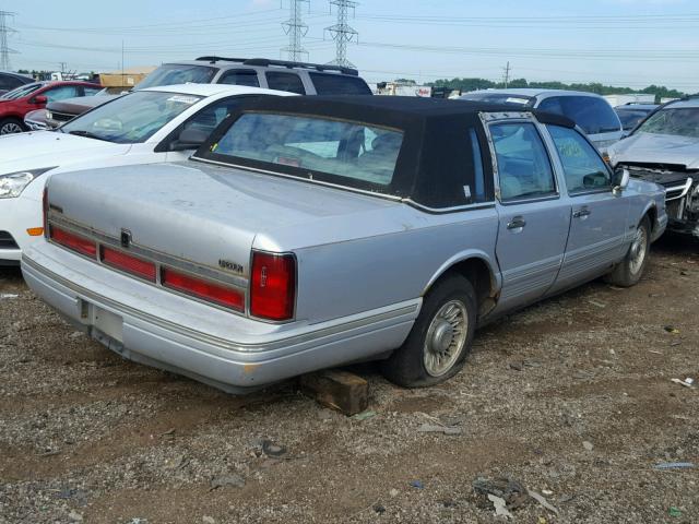 1LNLM81WXVY652860 - 1997 LINCOLN TOWN CAR E SILVER photo 4