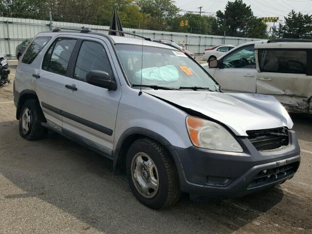 JHLRD78444C017578 - 2004 HONDA CR-V LX SILVER photo 1