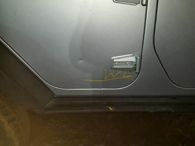 1C4BJWDG6CL101188 - 2012 JEEP WRANGLER U SILVER photo 9