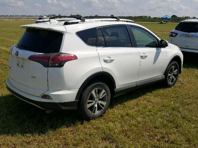 JTMWFREV7HJ110034 - 2017 TOYOTA RAV4 XLE WHITE photo 4