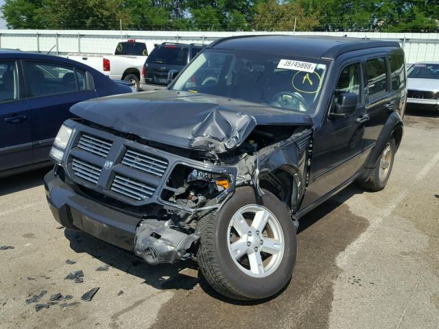 1D4PU5GK3BW544339 - 2011 DODGE NITRO SXT GRAY photo 2