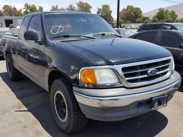 2FTRX17224CA66869 - 2004 FORD F-150 HERI BLACK photo 1