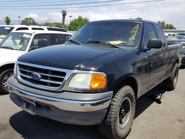 2FTRX17224CA66869 - 2004 FORD F-150 HERI BLACK photo 2