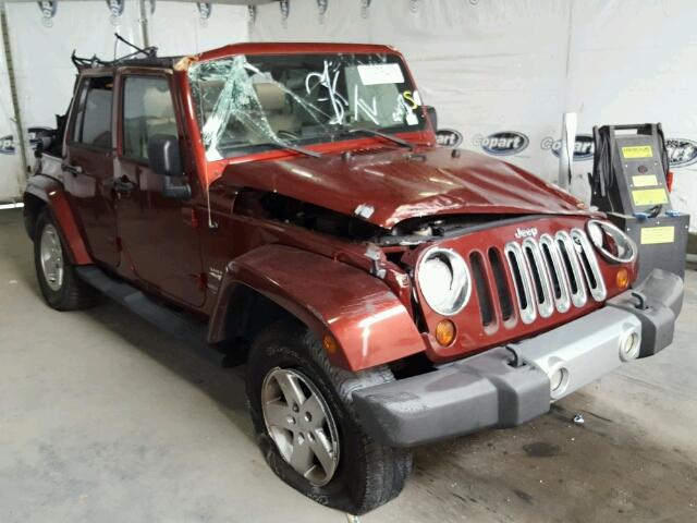 1J4GA59179L762185 - 2009 JEEP WRANGLER U BURGUNDY photo 1