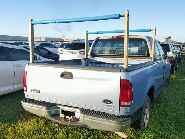 1FTZX1722WKA64733 - 1998 FORD F150 BLUE photo 4