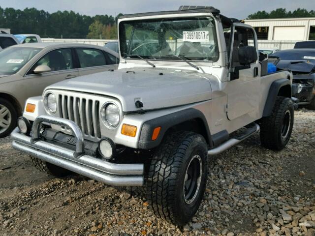 1J4FA49SX4P760429 - 2004 JEEP WRANGLER / SILVER photo 2