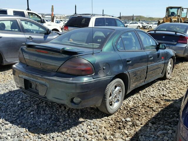 1G2NW52E52M565080 - 2002 PONTIAC GRAND AM G GREEN photo 4