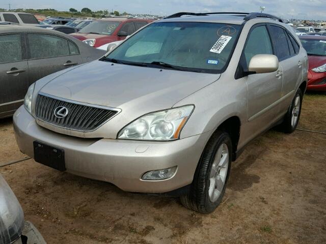 2T2GK31U07C010468 - 2007 LEXUS RX GOLD photo 2