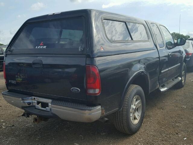 1FTRX18LX2NB15394 - 2002 FORD F150 BLACK photo 4