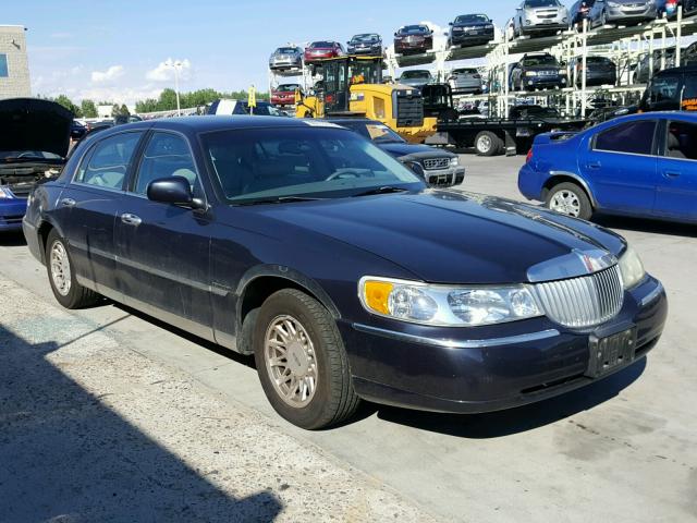 1LNHM82W4XY699180 - 1999 LINCOLN TOWN CAR S BLUE photo 1