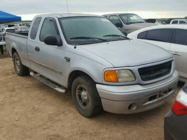 2FTRX17W44CA06692 - 2004 FORD F-150 HERI SILVER photo 1