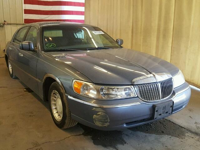 1LNHM81WXYY908103 - 2000 LINCOLN TOWN CAR E BLUE photo 1