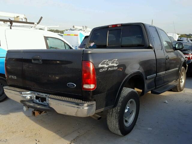 1FTZX18W5WNC22918 - 1998 FORD F150 BLACK photo 4