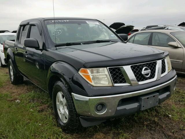 1N6AD07U36C404559 - 2006 NISSAN FRONTIER C BLACK photo 1