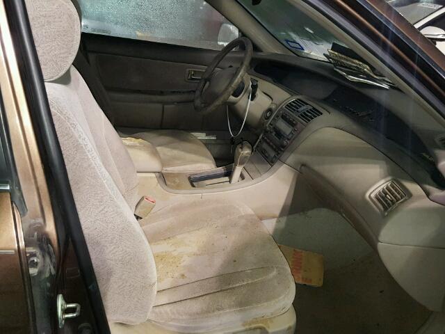 4T1BF28B7YU025616 - 2000 TOYOTA AVALON BROWN photo 5
