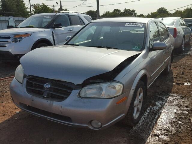 JN1CA31D21T825649 - 2001 NISSAN MAXIMA GXE BEIGE photo 2