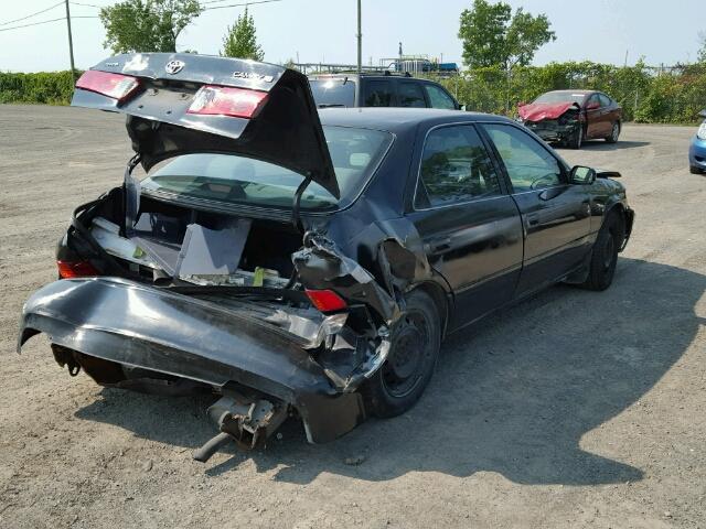 JT2BG22KX10581225 - 2001 TOYOTA CAMRY CE BLACK photo 4