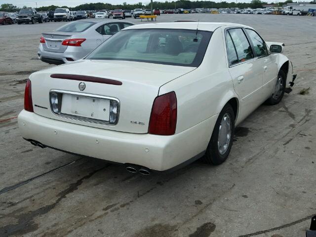 1G6KE57Y81U145092 - 2001 CADILLAC DEVILLE WHITE photo 4