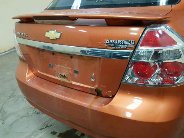 KL1TD56617B093840 - 2007 CHEVROLET AVEO BASE Pomarańczowy zdjęcie 9