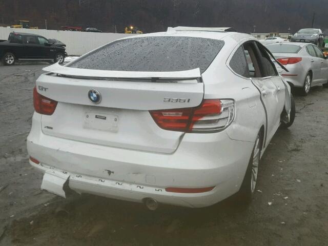 WBA3X9C58ED152738 - 2014 BMW 335 XIGT WHITE photo 4