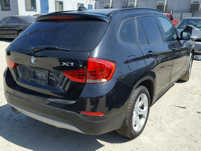 WBAVM1C5XFV317414 - 2015 BMW X1 SDRIVE2 BLACK photo 4