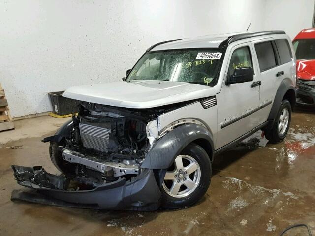 1D8GU28K77W644916 - 2007 DODGE NITRO SXT SILVER photo 2