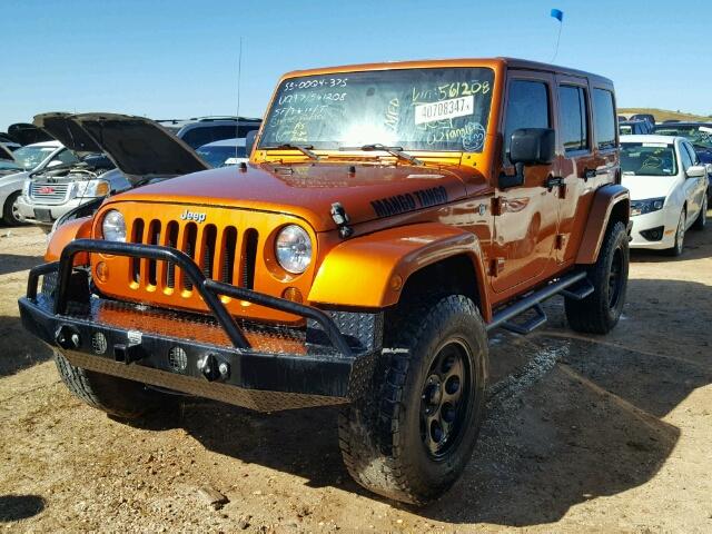 1J4BA5H15BL561208 - 2011 JEEP WRANGLER U ORANGE photo 2