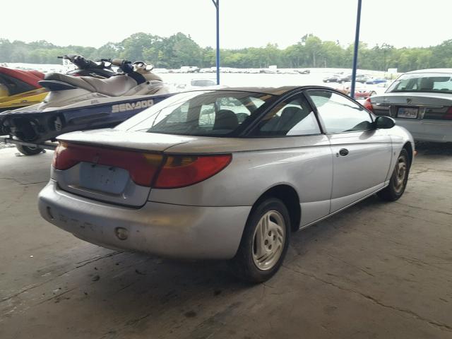 1G8ZN12812Z241379 - 2002 SATURN SC1 SILVER photo 4