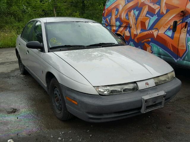 1G8ZH5286XZ371616 - 1999 SATURN SL1 GRAY photo 1