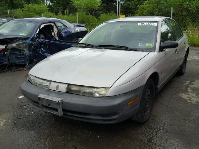 1G8ZH5286XZ371616 - 1999 SATURN SL1 GRAY photo 2