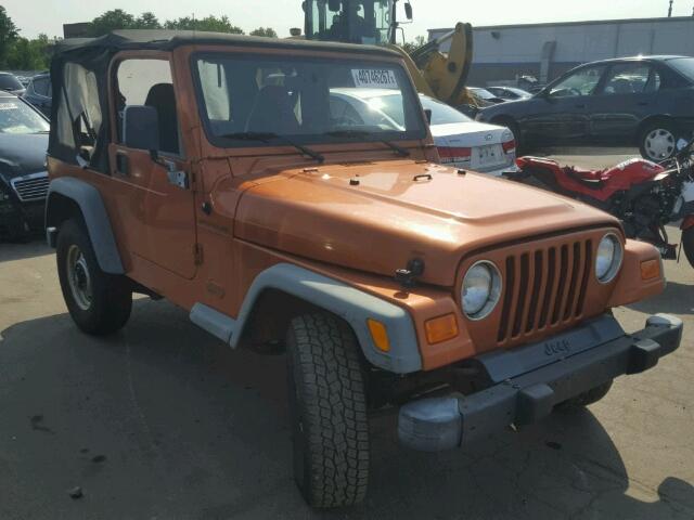 1J4FA29P9YP793542 - 2000 JEEP WRANGLER / ORANGE photo 1