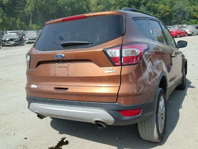 1FMCU9GDXHUA18035 - 2017 FORD ESCAPE SE ORANGE photo 4