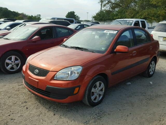 KNADE223296514610 - 2009 KIA RIO BASE ORANGE photo 2