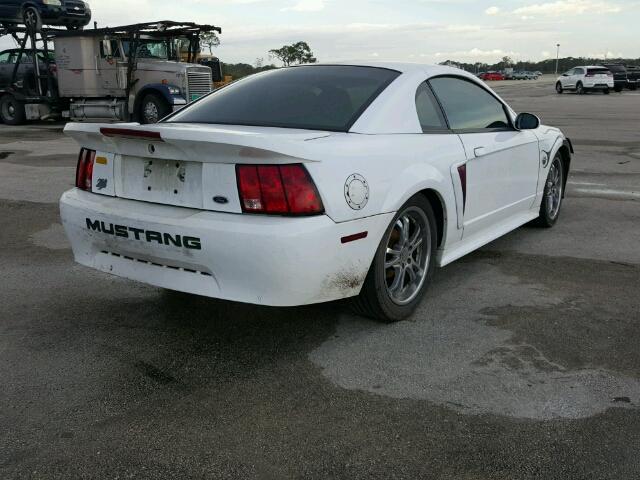 1FAFP4046YF252138 - 2000 FORD MUSTANG WHITE photo 4