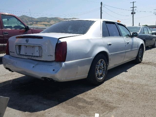 1G6KF5796YU217679 - 2000 CADILLAC DEVILLE DT SILVER photo 4