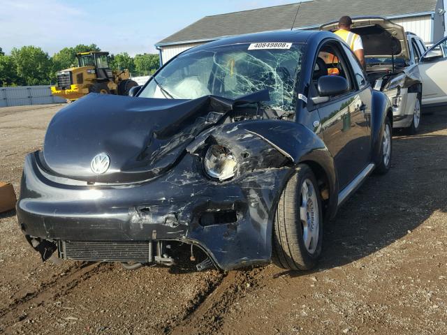 3VWDD21C8XM461297 - 1999 VOLKSWAGEN NEW BEETLE 黑色 照片 2