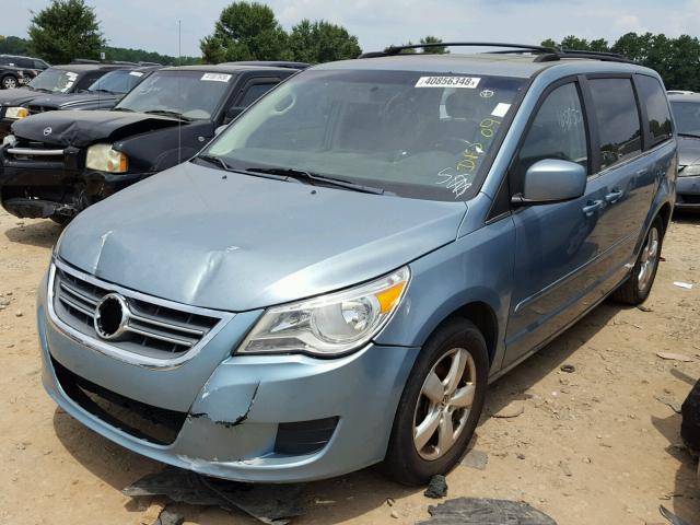 2V8HW34109R585921 - 2009 VOLKSWAGEN ROUTAN SE BLUE photo 2