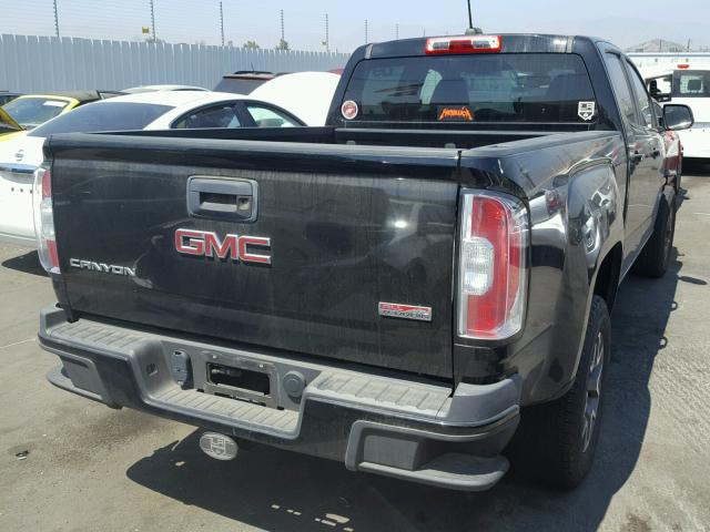 1GTG5BE34F1229069 - 2015 GMC CANYON SLE BLACK photo 4