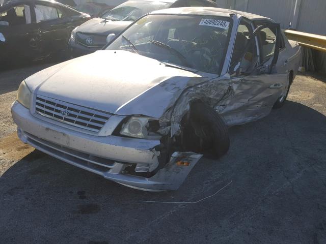 KNAGD126515077586 - 2001 KIA OPTIMA MAG SILVER photo 2