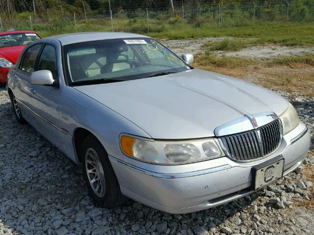 1LNHM82W41Y653257 - 2001 LINCOLN TOWN CAR SILVER photo 1