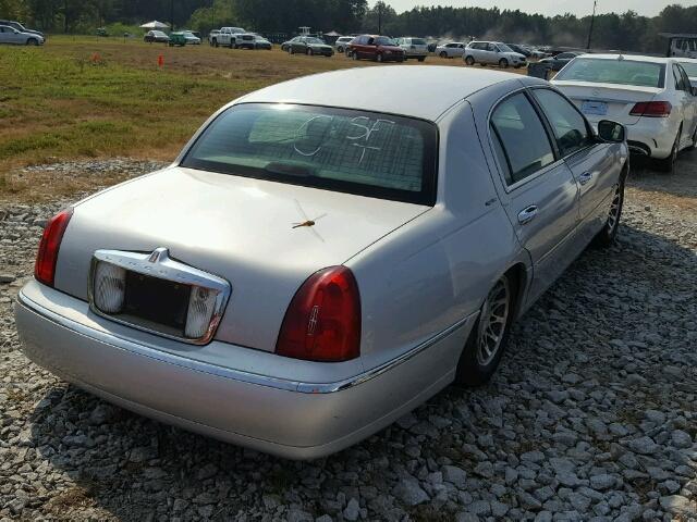 1LNHM82W41Y653257 - 2001 LINCOLN TOWN CAR SILVER photo 4