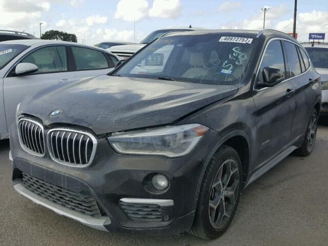 WBXHT3C33GP888703 - 2016 BMW X1 XDRIVE2 Braun Foto 2